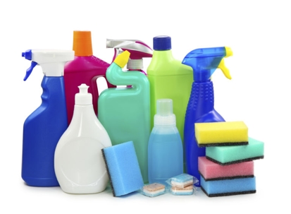 Several colorful cleaning bottles and sponges are shown.
