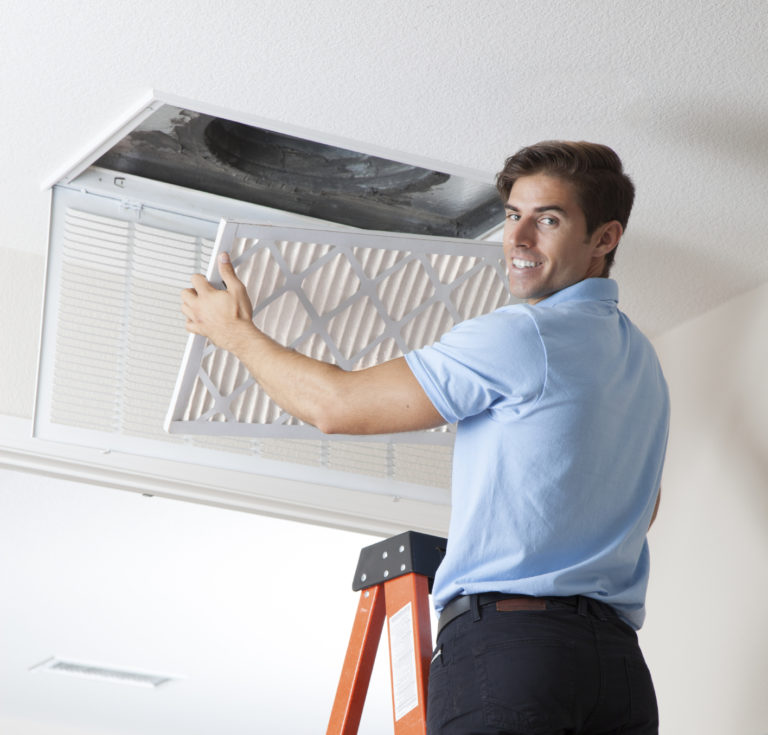 Tech fixing AC